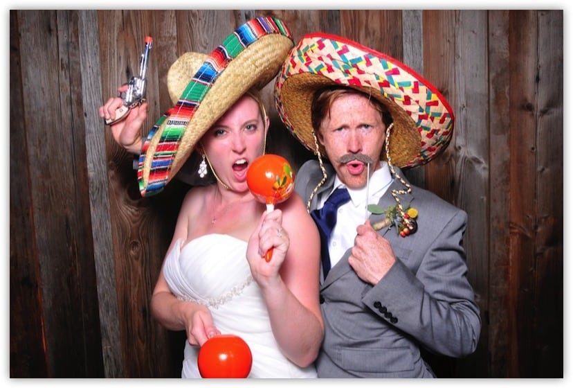 Bride and Groom with fun props 