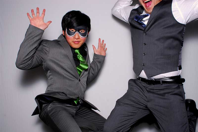 school function - Two Students Jumping in the photo at the prom