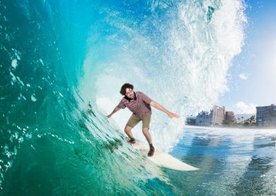 Man surfing in hawaii